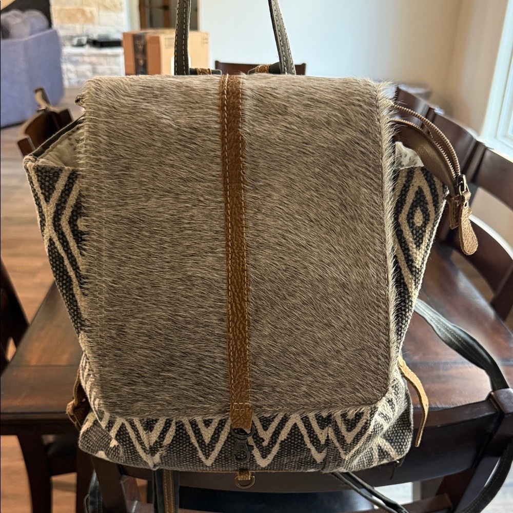 Myra Bag Cream and Brown skinned backpack